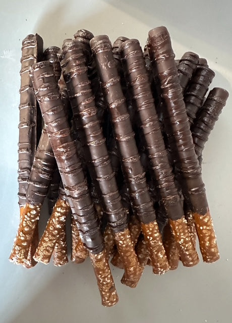 Gift box of decorated chocolate-dipped pretzel rods